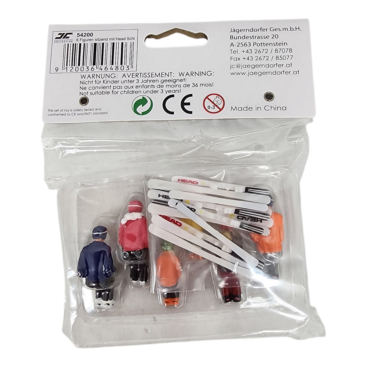 6 Piece sitting figurines with Skis - Red/Orange