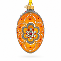 White Flower On Orange Glass Egg Ornament 4 Inches